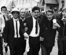 John Hume assisted from civil rights demonstration