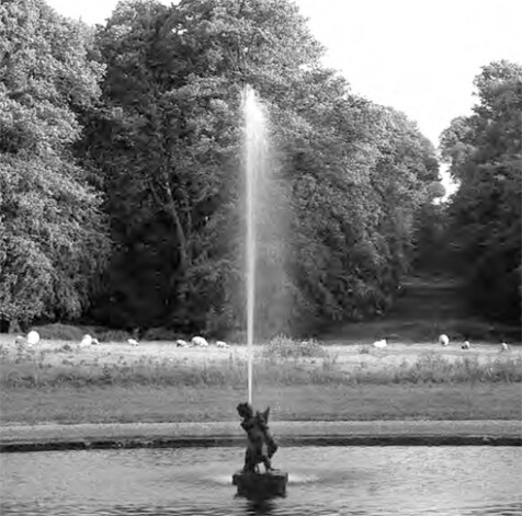 A water jet in the circular pond at Killruddery House